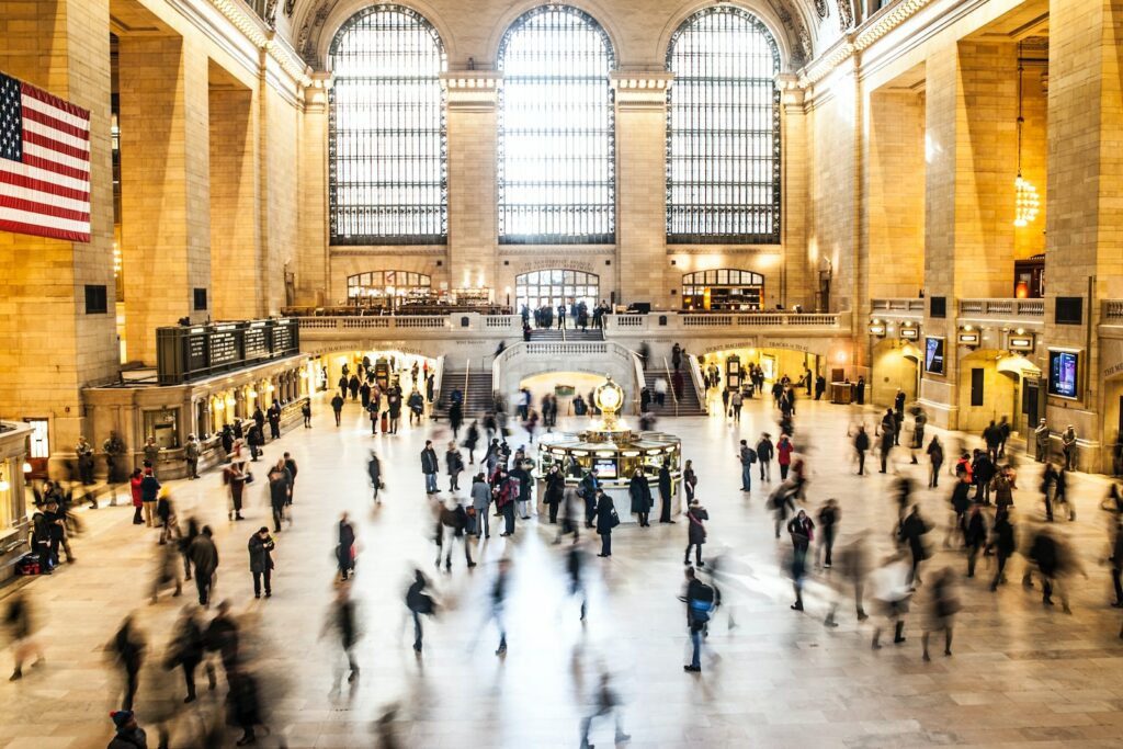 time lapse photography of group of people inside building