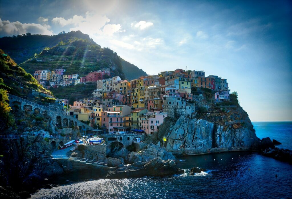 HDR seaside town on cliff during daytime