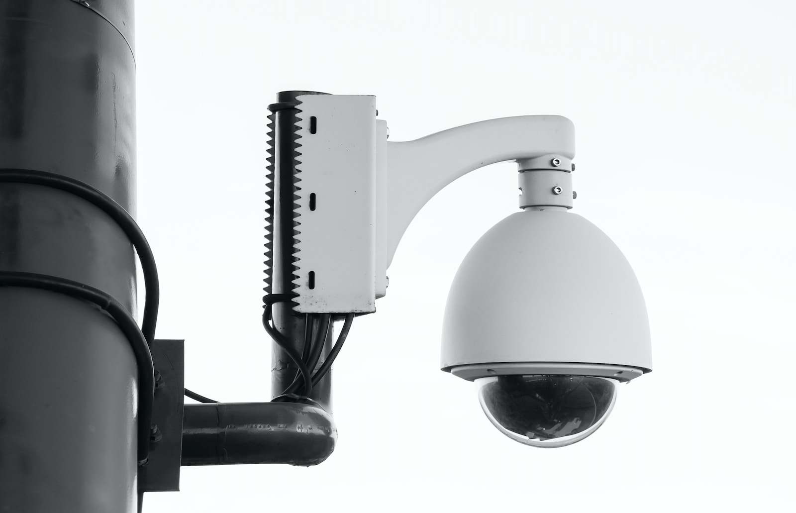 Future of Security Cameras white security camera on post
